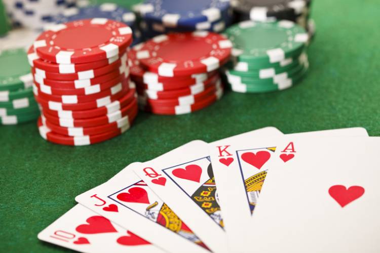 Poker, royal flush and gambling chips